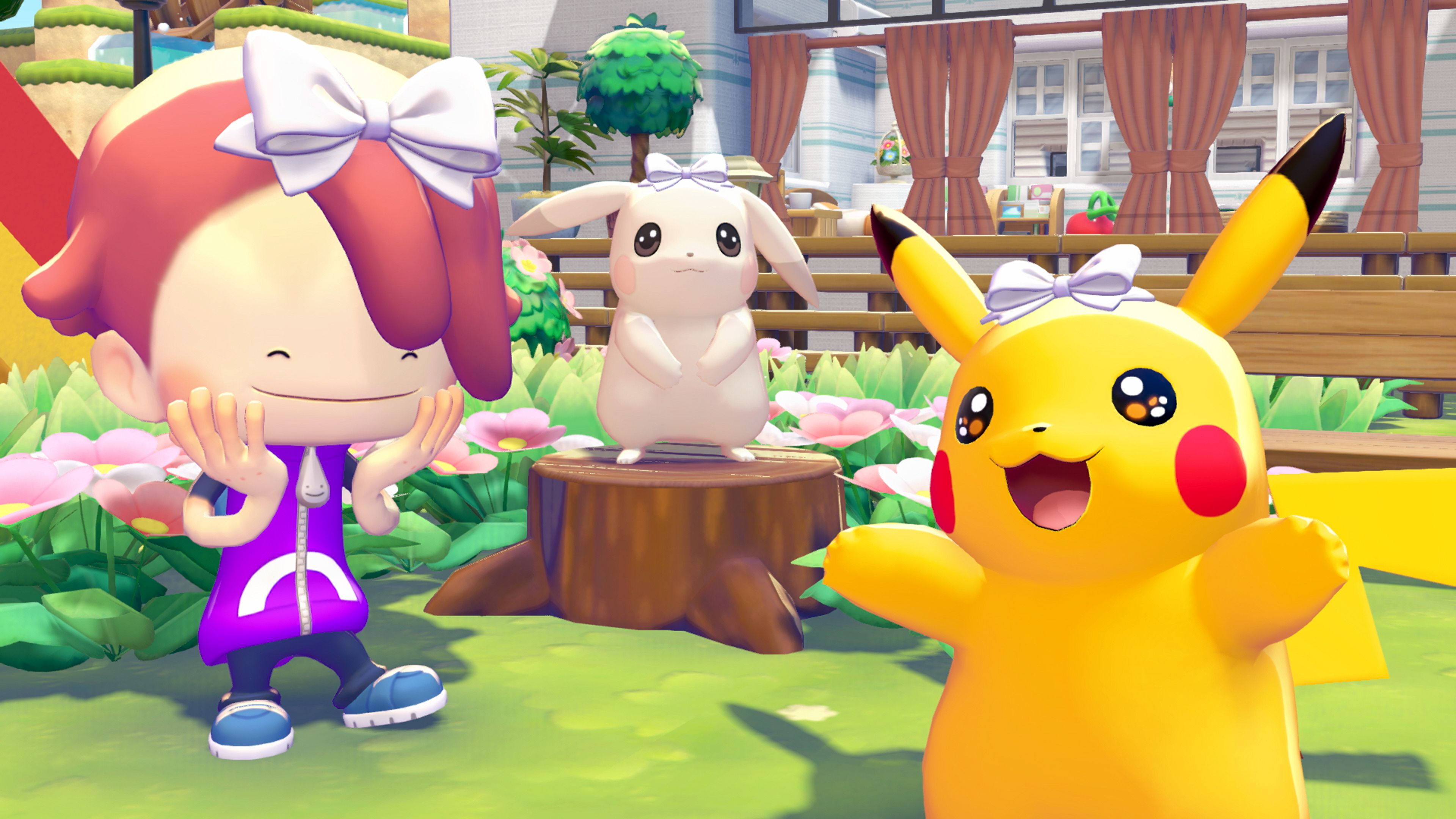 Offisielt Pokopia-pressebilde med en trener, Pikachu og Eevee i et bebygd område. Tidligere spillbilde, ikke en demonstrasjon av 2.0-funksjonene.